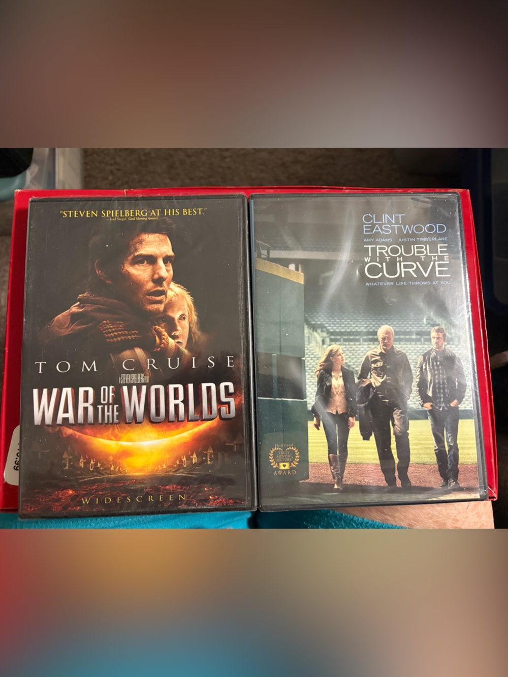 (2) DVD’s New. (1) The War of the Worlds-Cruise (2) Trouble w/the Curve-Eastwood